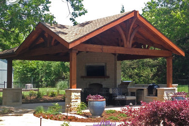 Photo of a large one-storey exterior in Dallas with a gable roof and a shingle roof.