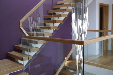 Photo of a modern staircase in Surrey.