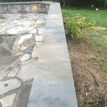 Irregular Flagstone Patioin Silver Spring MD With Stone Sitting Walls