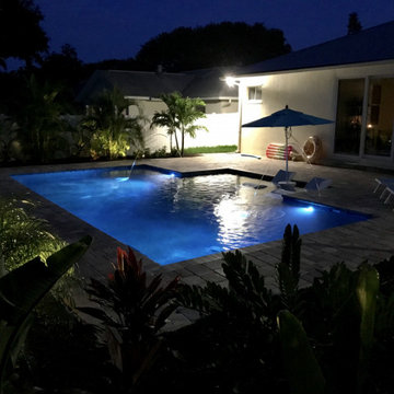 Modern Pool with Advanced LED Lighting and Water Features