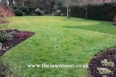 Inspiration for a medium sized traditional side partial sun garden in Cheshire.