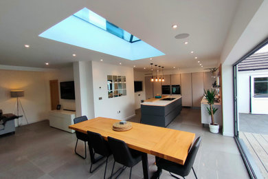 This is an example of a modern dining room in Devon.