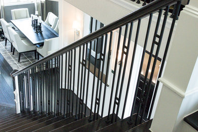 Example of an arts and crafts staircase design in Houston