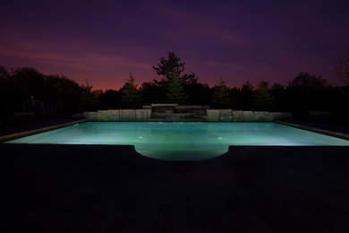 Pool fountain - mid-sized traditional backyard rectangular and concrete lap pool fountain idea in Other