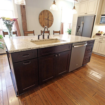 Painted Cream with Brown Glaze Cabinets with Giallo Granite Countertops ~ Sevill