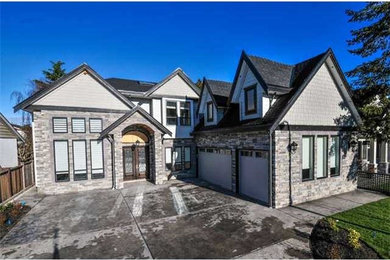 Trendy gray two-story exterior home photo in Vancouver
