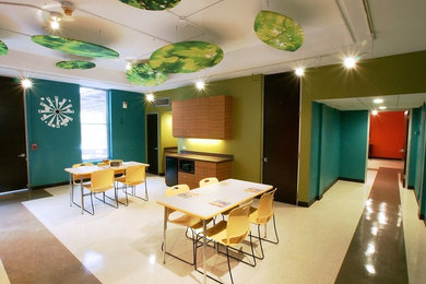 Example of a mid-century modern dining room design in Houston