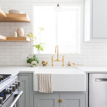 Tinge Floral: Glazed Thin Brick Backsplash with Farmhouse Sink