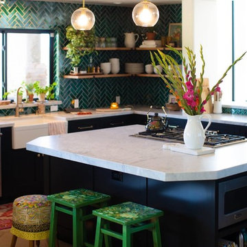Black kitchen cabinets and kitchen island