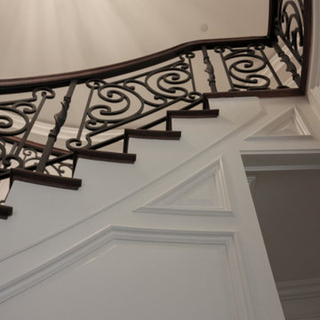 Project #74 | Circular Staircase with Hand-Forged Metal Panels