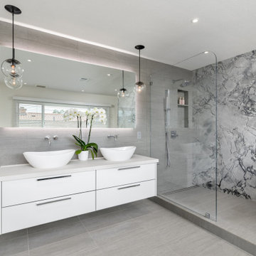 Contemporary Master Bathroom with striking features