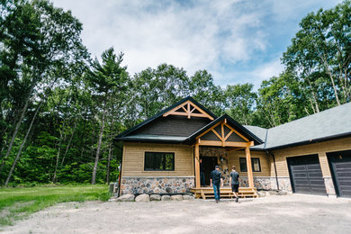 Example of a mid-sized minimalist multicolored two-story mixed siding house exterior design