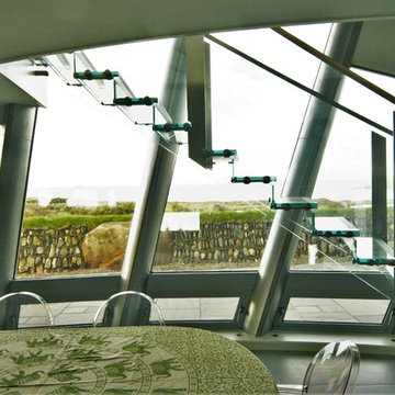 Coastal Dining Room, with floating glass stair