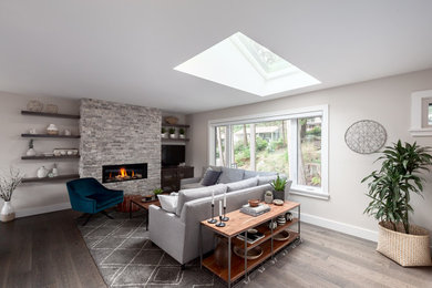 Mid-century modern living room photo in Vancouver