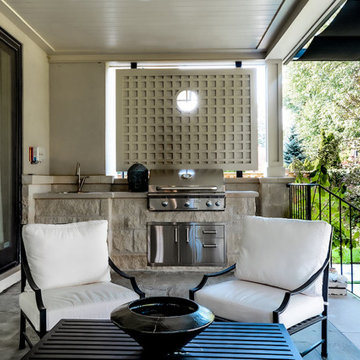 Outdoor Firepit with Retractable Pergola & Flagstone