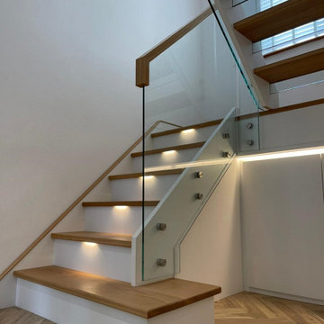 Oak & White Staircase with Structural Glass