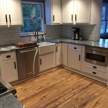 cabinet refacing-- white with soapstone countertops and subway tile backsplash
