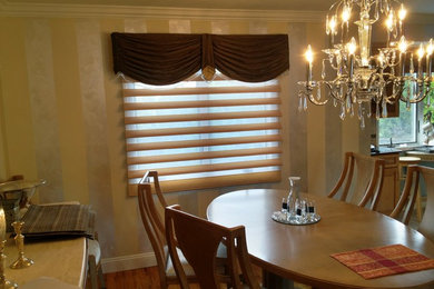Example of a trendy dining room design in New York