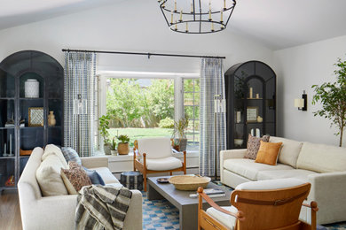 Farmhouse living room photo in Denver