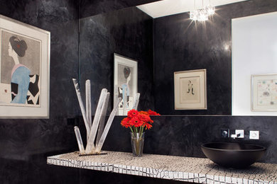 Inspiration for a contemporary bathroom remodel in Denver with a vessel sink and black walls