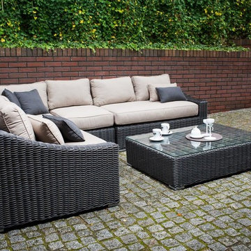 Toja Patio Furniture - Tuscan Sectional Set - Red Brick Wall