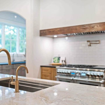 Luxurious Modern Farmhouse Kitchen: Oversized Marble Island, Pro Appliances, and
