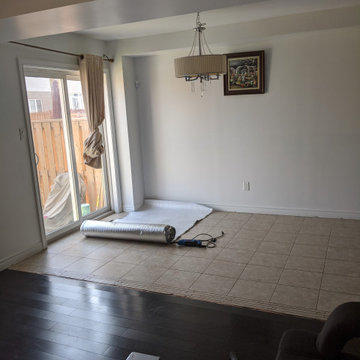 Laminate Installation Over Tile to Extend Our Customers Livingroom