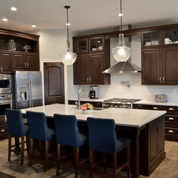 Transitional Kitchen with Dark Wood Cabinets & White Countertops