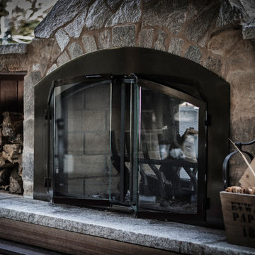 Double Sided Outdoor Fireplace with Deck and Pavilion