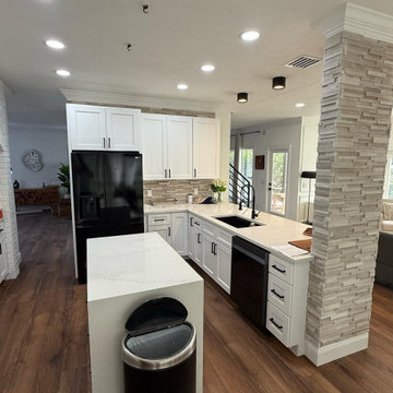 **Complete Kitchen, Flooring, Complete Stair Case and Trim