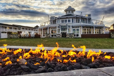 Deck - mid-sized coastal backyard deck idea in Portland Maine with a fire pit and no cover