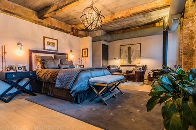Example of an urban bedroom design in Chicago
