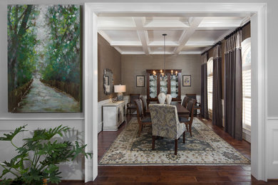 This is an example of an expansive transitional separate dining room in Other with grey walls and dark hardwood floors.