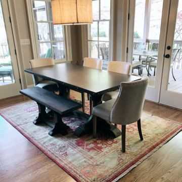Oushak Rug completes neutral dining room design with color, pattern and texture!