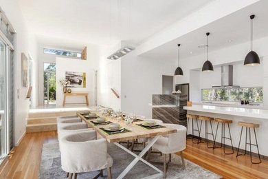 Design ideas for a modern dining room in Sunshine Coast.