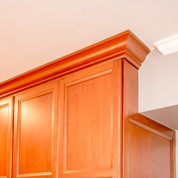 Existing Bulkhead intersecting pantry cabinet with custom end panel