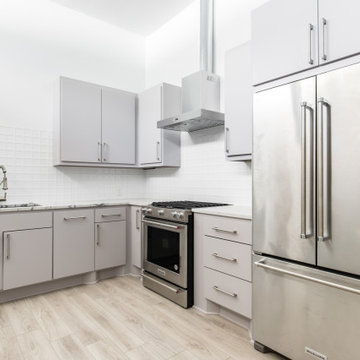 Stunning Commercial Office Kitchen with Kitchen Aid Appliances and Custom Renown