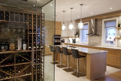 Inspiration for a large contemporary porcelain tile kitchen remodel in Montreal with an undermount sink, flat-panel cabinets, quartz countertops, gray backsplash, porcelain backsplash, stainless steel appliances and an island