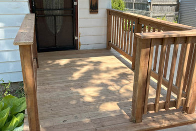 This is an example of a rustic porch design in Chicago.
