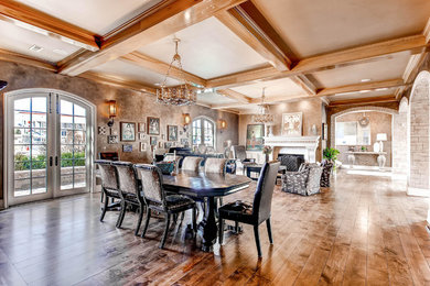Tuscan dining room photo in Denver