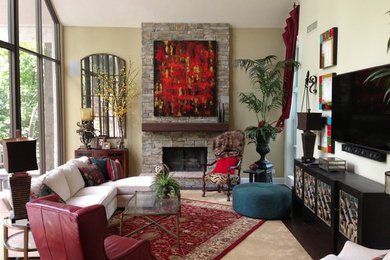 Large transitional formal and loft-style dark wood floor and beige floor living room photo in Houston with beige walls, a standard fireplace, a stone fireplace and a wall-mounted tv