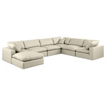 Meridian Furniture - Comfy Upholstered U-Shaped Modular Sectional, Cream, 7-Piece: 3 Armless Chair, 3 Corner Chair, 1 Ottoman, Vegan Leather - Give your space a whole new look with this cream Comfy vegan leather sectional. This handsome sectional fits nicely with other items in the Comfy collection and is a versatile seating option designed for adaptability, comfort and style. Wrapped in rich cream durable vegan leathered upholstery, this sectional offers a plush embrace of overstuffed down feather cushions, carefully crafted to deliver the highest level of comfort. The perfect seat for creating an oasis for relaxation, this sectional has thick foam surrounding its frame for added support and coziness.