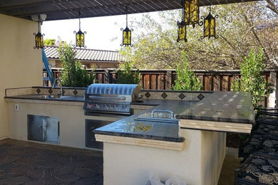 Example of a tuscan kitchen design in San Diego