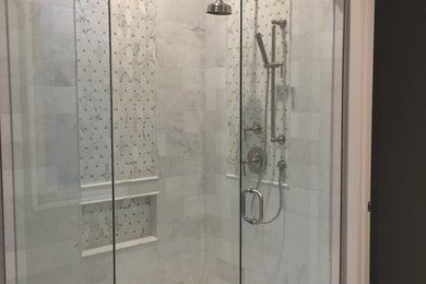 Mid-sized elegant master gray tile and subway tile marble floor and gray floor corner shower photo in Other with a hinged shower door