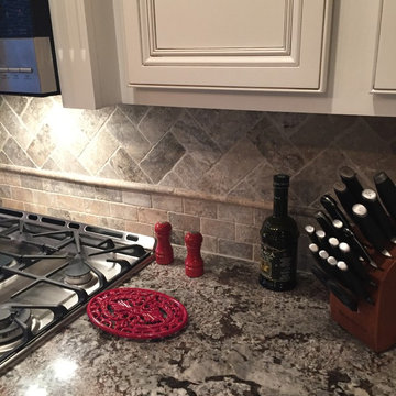 3cm Ogee Bullnose Countertop with Silver travertine tumbled backsplash