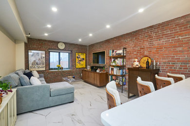 Example of a transitional living room design in Boston