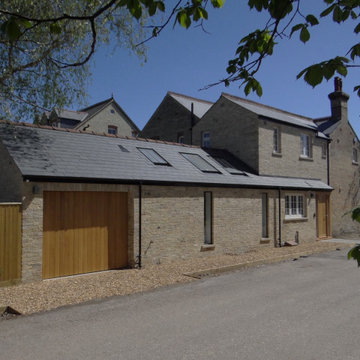 Contextural brick extensions to Cambridge Townhouse & newbuild Annex