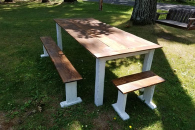 Reclaimed wood dining table and benches