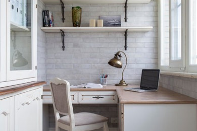 This is an example of a traditional study room in Moscow with a built-in desk.