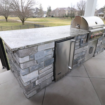 Lake Forest Outdoor Living Stone Patio with 2 Roof Structures